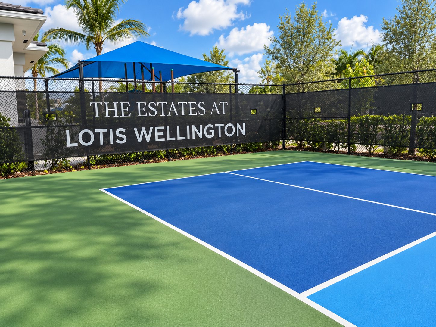 The Estates at Lotis Wellington pickleball court and sign